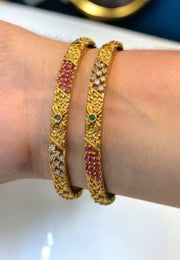 Beautiful antic simple bangles with ruby and green stone work